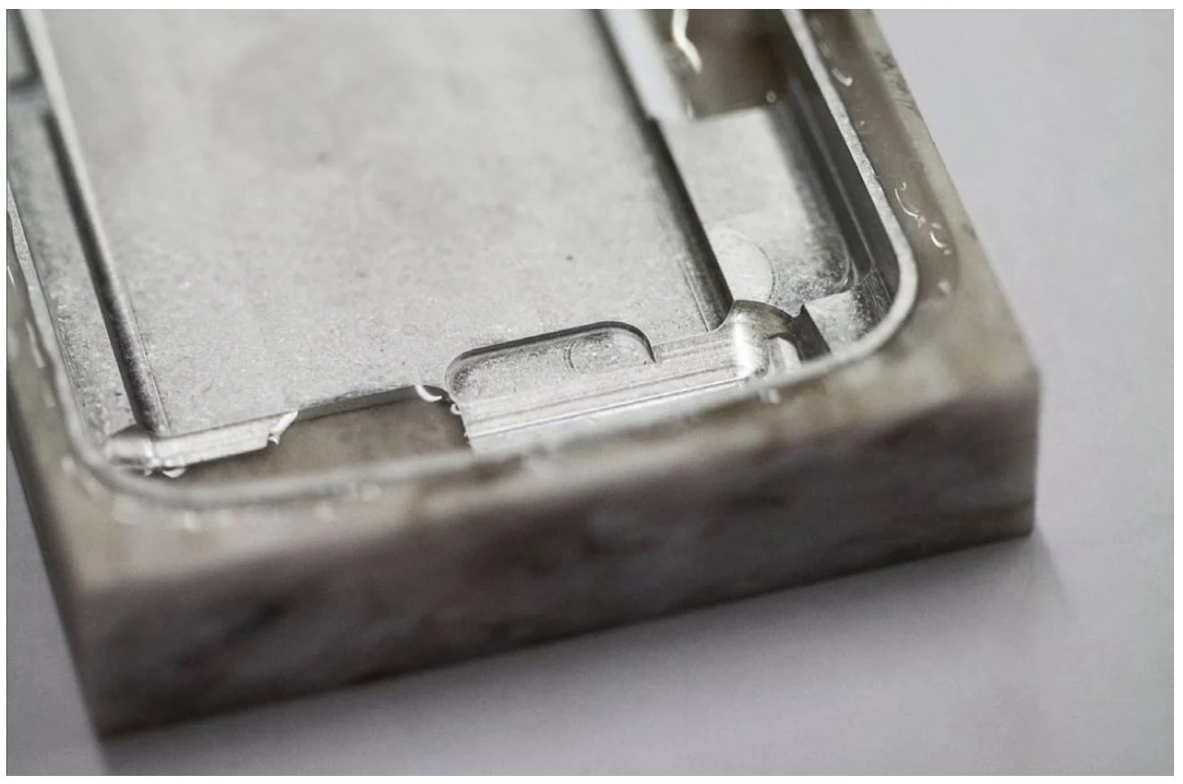 The Corian shell bonded to its aluminium chassis, with reinforcement in the radio-frequency windows.